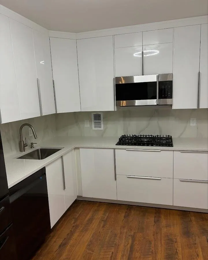 Restored kitchen with white cabinets after water damage in Pearl